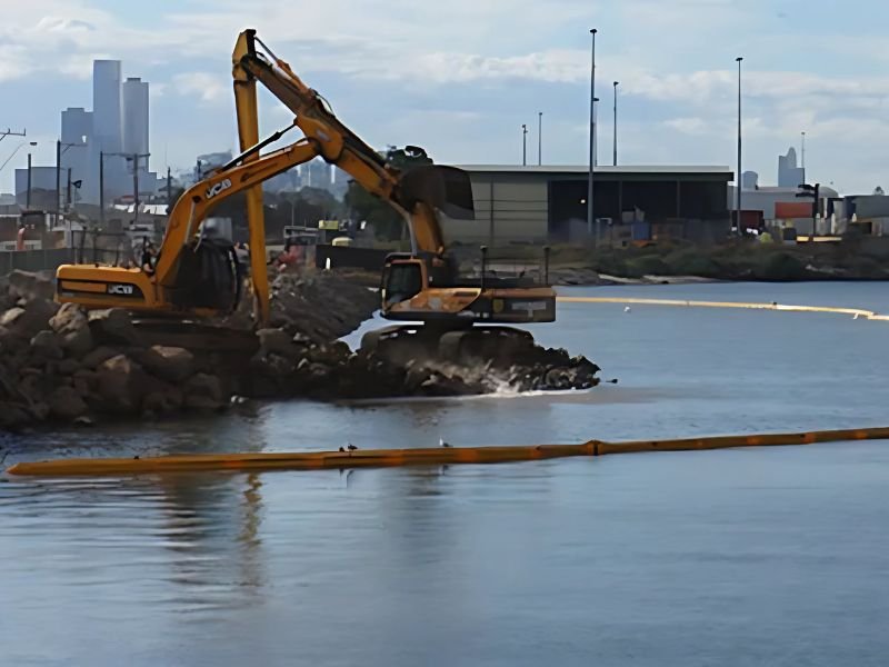 Silt curtain installed at waterfront construction site to prevent erosion